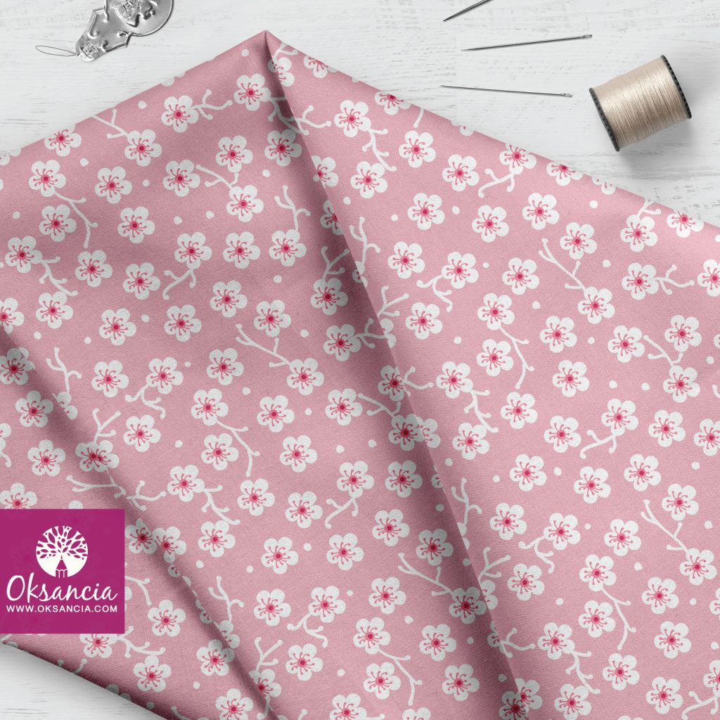 Pink sakura flowers vector repeat pattern design on fabric by Oksancia